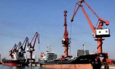 A two-phase model for dry port location with an application to the port of Dalian in China