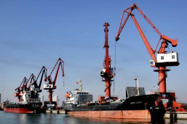 A two-phase model for dry port location with an application to the port of Dalian in China