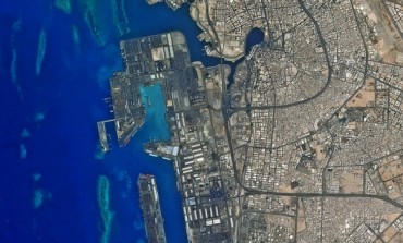 Port geography at the crossroads: between flows & spaces
