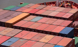 Urban gravity in the global container shipping network